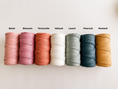 Load image into Gallery viewer, An image of macrame cord in 7 different colors available.